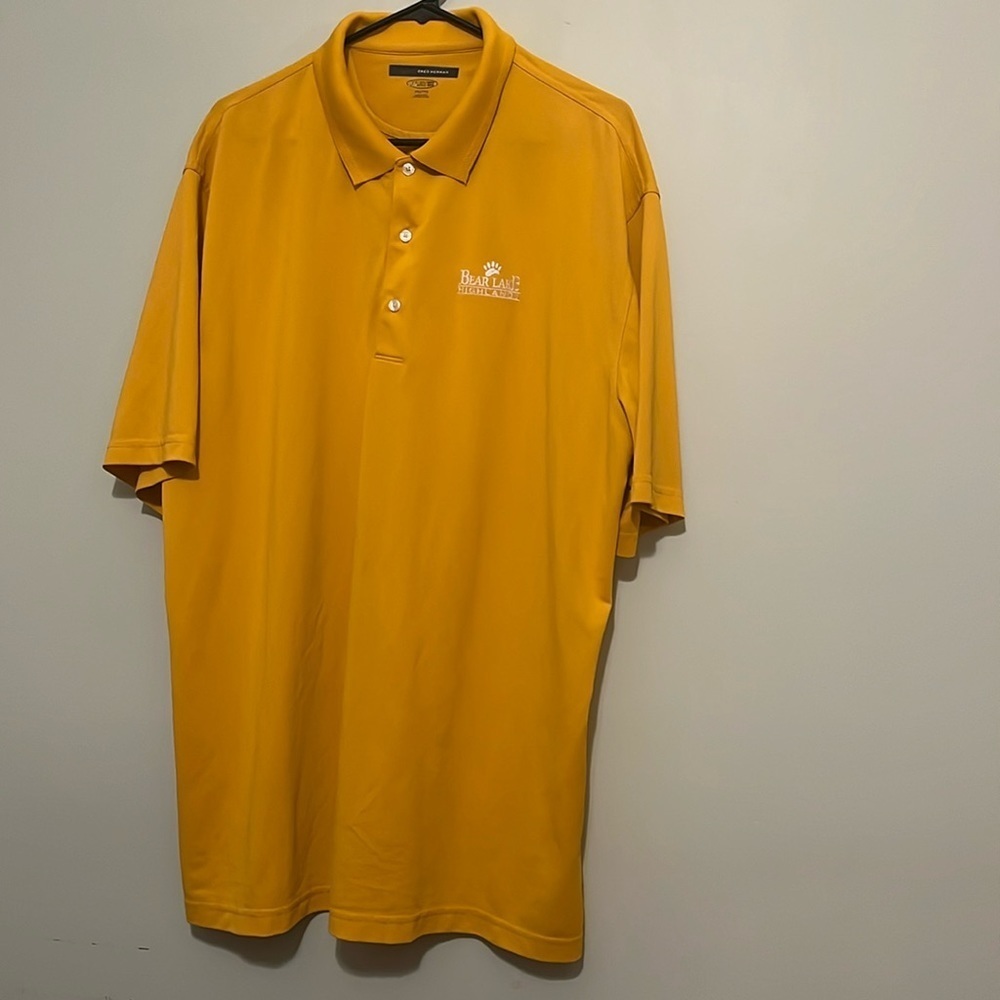 Men’s yellow golf polo size XXL. Greg Norman Brand from bear lake highlands
